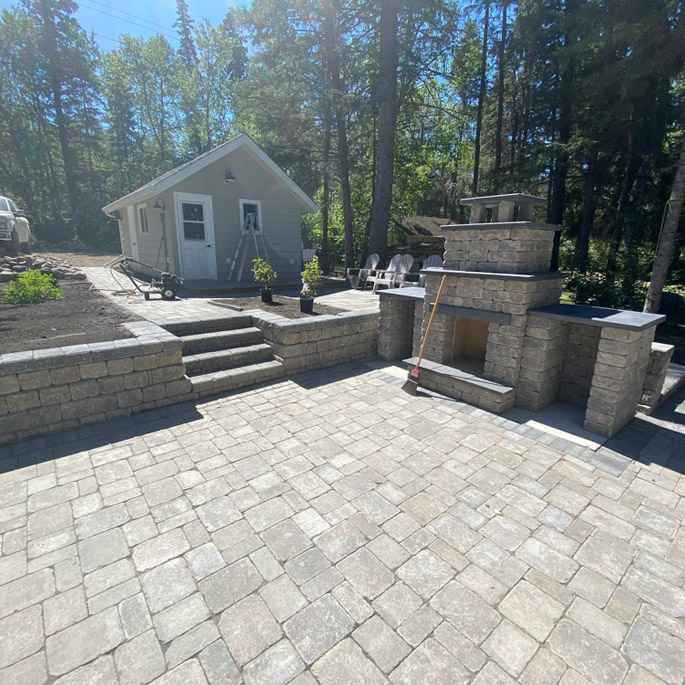 paving stones, retaining wall and fireplace